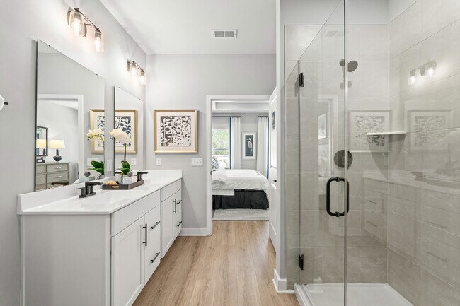 Enjoy a dual vanity, modern finishes, and a spacious walk-in shower– nothing but the best in your new home. Learn more about what comes included.