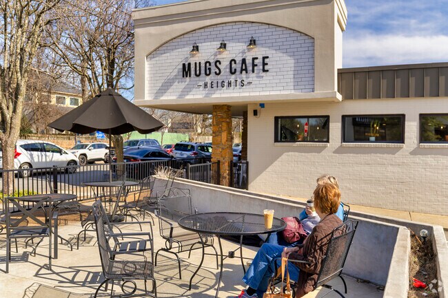 Sit outside and enjoy the day at Mugs Cafe in the Heights.