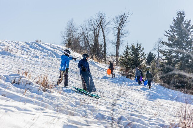 Sledding is a family favorite activity in winter in Ponderosa Pines.