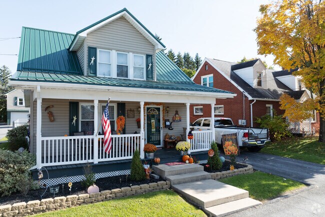 With a great front porch this classic farmhouse style will keep you covered.
