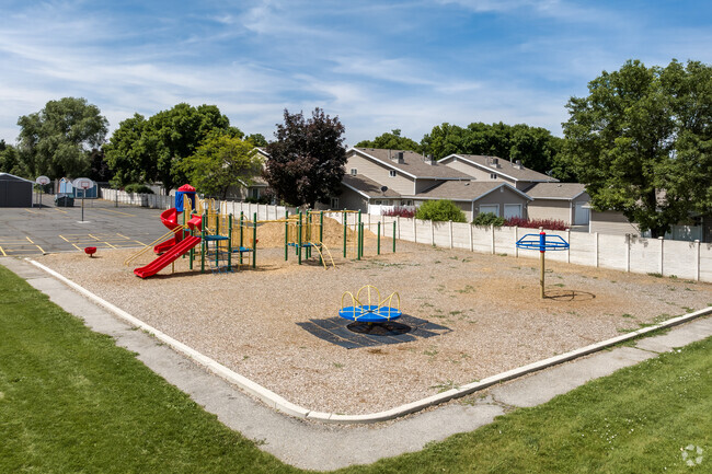 A playground with wood chips on the ground at Liberty Elementary School.