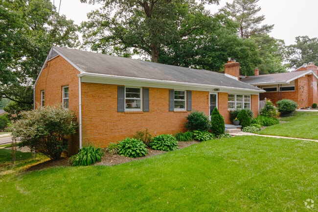 A brick Cape Cod home with a large yard on 64th Ave in Cheverly.