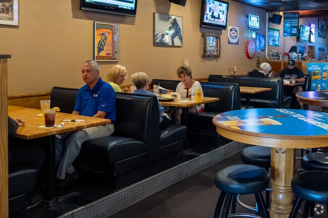 The Other Place in Neighbors Who Care serves up a unique taco pizza in a fun, casual setting.