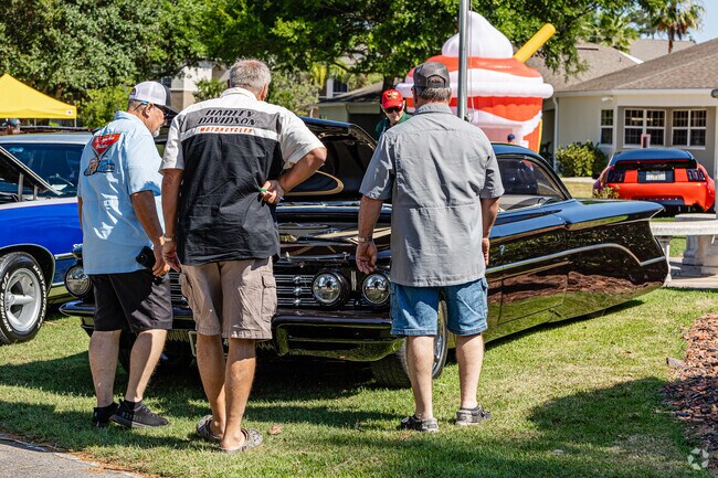 Friends are debating about the most popular car in the Rev It Up! car show.