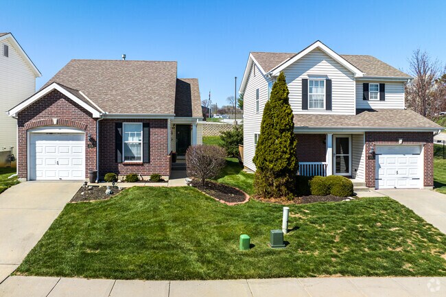 Brick homes with manicured lots.