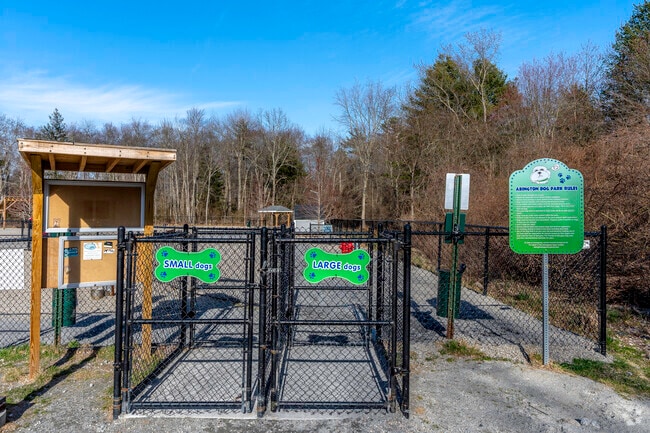The entrance to Abington dog park allows dogs to enter and exit safely.