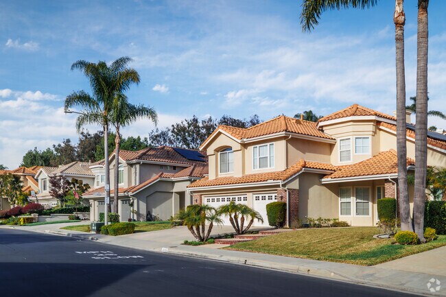 Spanish-style homes with palm trees capture the Southern California vibe of Forster Ranch.
