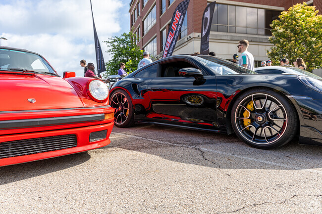 The future reflects the past at Cars and Coffee in Miamisburg.