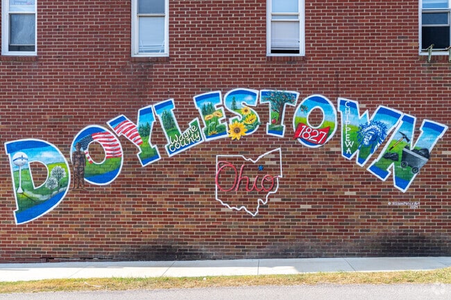A mural beautifully celebrates the rich history of Doylestown, highlighting its unique cultural heritage.