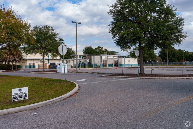 The bus drop-off is positioned on the south side of Azalea Park Elementary School.