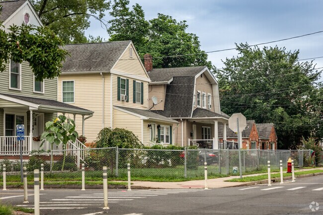 The multi-family architecture reflects a prominent style that gained popularity in North End.
