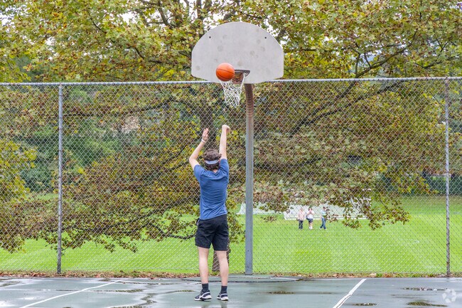 Practice your shot at the basketball court at Orchard Park.