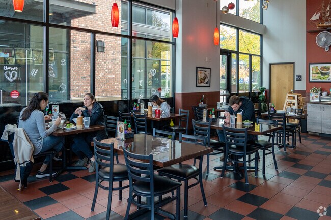 Customers enjoy lunch noodles at Pho Nam.