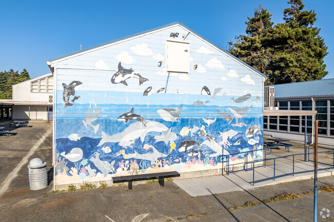 This vibrant mural of whales is located at Cutten Elementary School.