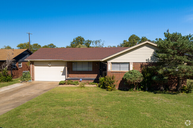 This Johansen Acres home has beautiful red brick siding.