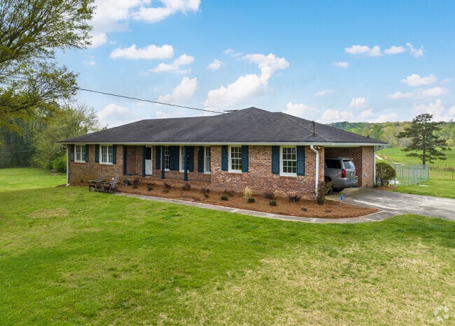 Ranch style homes sit on large acreage lots in South Fulton.