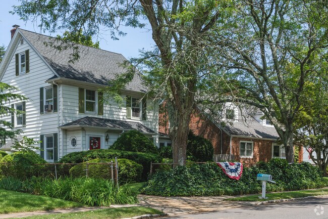Cape Cod Revival style homes can also be found in East Norwich.