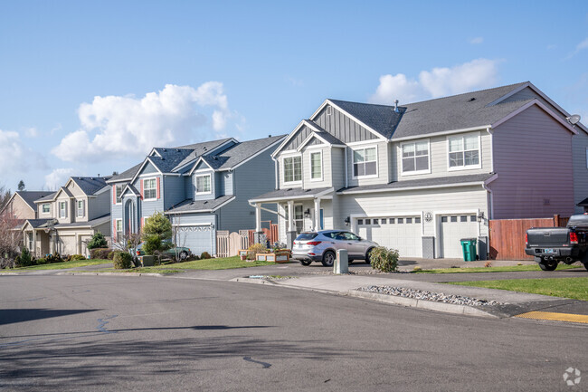 Well-maintained homes line the streets of the Sweetbriar neighborhood.