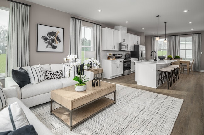 Included 42-inch white cabinets and 6-foot kitchen islands—customize your dream space with finishes you love.