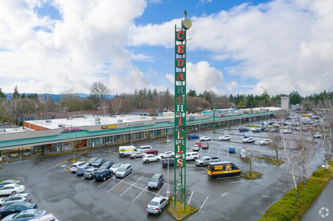 The Cedar Hills Shopping Center is also home to a towering neon sign spelling out Cedar Hills and has become a local landmark itself.