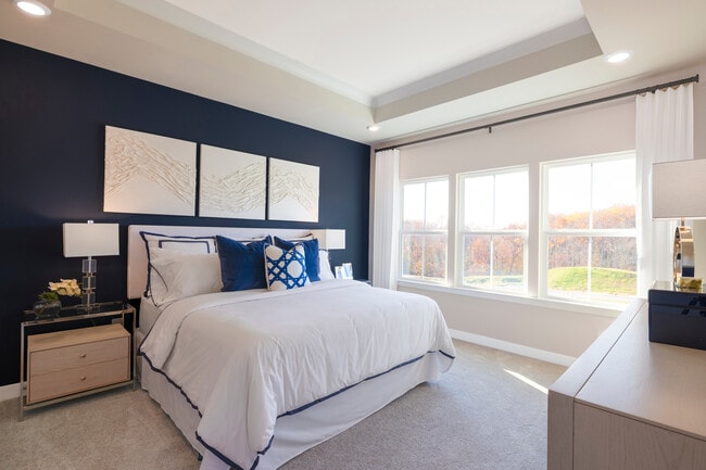 Your spacious owner’s suite is a private escape, with a tray ceiling, luxurious attached bath, and a large walk-in closet. Click here to schedule your appointment and rest easier in a brand new home.