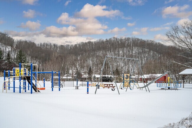 The playground at Ave Maria Academy overlooks the rolling hills of Plum City.