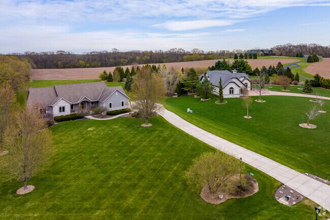Homes lining farm fields in Vernon.