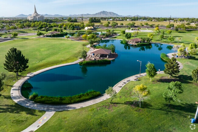 Large grassy areas and multiple lakes throughout Discovery District Park in South Gilbert.