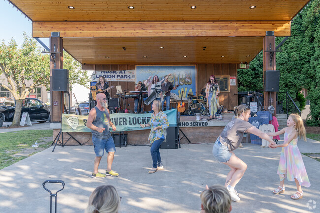 Arlington residents head to Music in the Park at Legion Memorial Park for summer time fun.