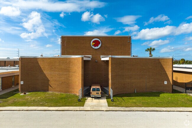 Leto High School's bus entrance is on the side street.