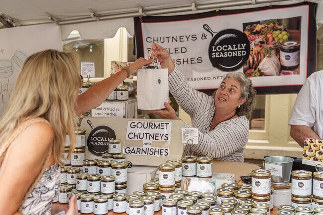 The Winterthur Artisan Market is filled with tents for local art, crafts, and gourmet foods.