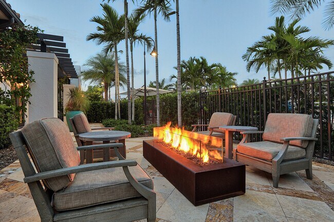 Outdoor lounges, including a firepit, allow you to enjoy the Florida weather throughout the year.