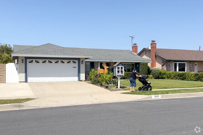 Pushing the stroller past little libraries and Ranch homes in Placentia.