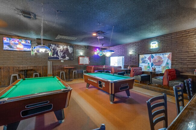 Experience laid-back vibes and great company at The Trough near University Manor.