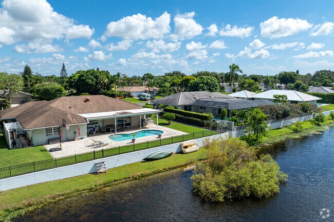 Ranch-style homes in Sherwood Lakeview enjoy calm water views and sunny yards.