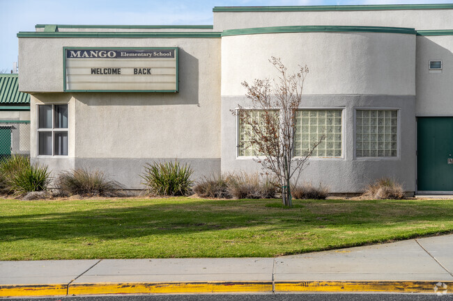 The signage of Mango Elementary School offers essential information and a warm welcome.