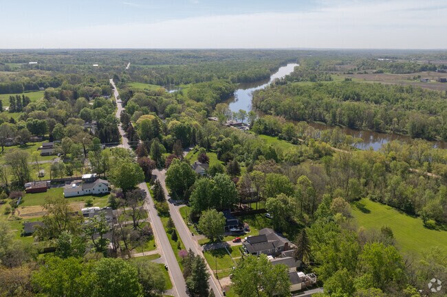 Lamont lies along the edges of the Grand River, flowing towards Grand Rapids.