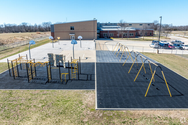 A small playground allows for outdoor play and physical education.
