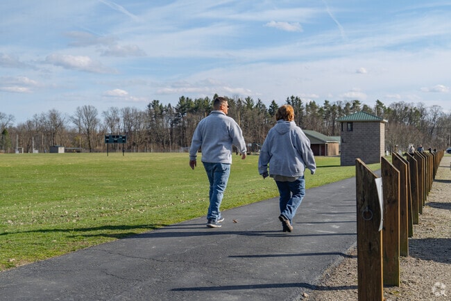 Locals of Ellery enjoy taking afternoon walks along the trail that surrounds the town park.