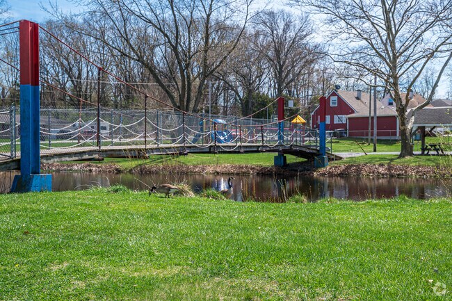 Enjoy the beautiful and sturdy bridge at Twin Oaks Park.