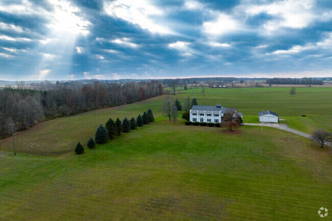 A beautiful home sits across the street from Greenbriar Golf Course in Rich Township.