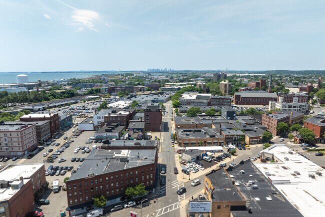 Highlands has a straight shot down route 107 to downtown Boston or the airport.