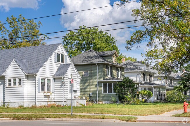 Compact lot sizes and shared driveways are common in Rochester’s older homes.