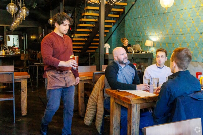 Located in downtown Wheaton, The Burger Social guests are getting their orders served.