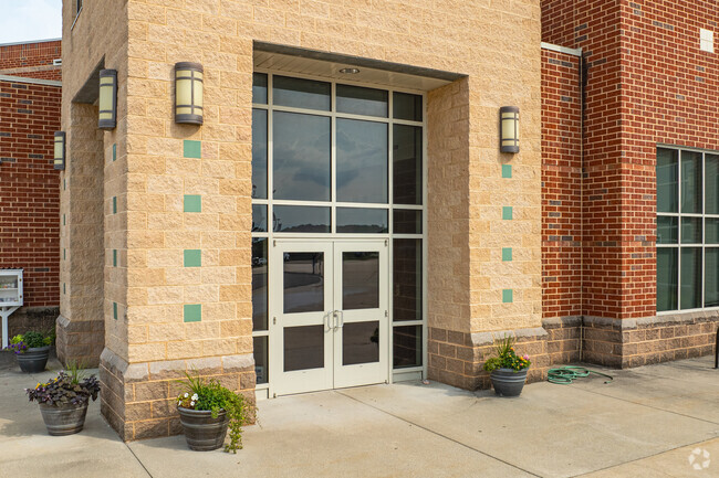 Lifelong learners enter through the main doors of Smithland Elementary School.