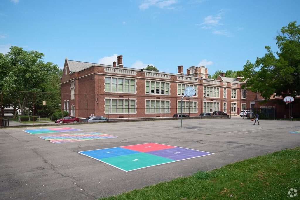 Charles Carroll School No. 46 offers a basketball court and black top for students to enjoy.