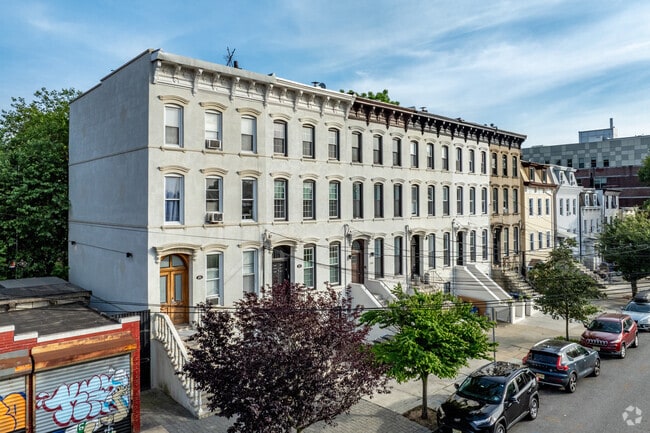 Picturesque streets are lined with charming homes throughout the neighborhood.