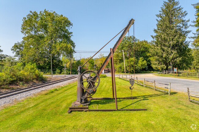 The remnants of old charcoal plantations sit along train tracks in Boggs at Curtin Village.