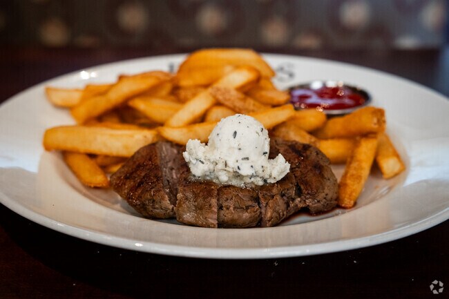 Stop by Firebirds for wood-fired steaks in Forest Hills.