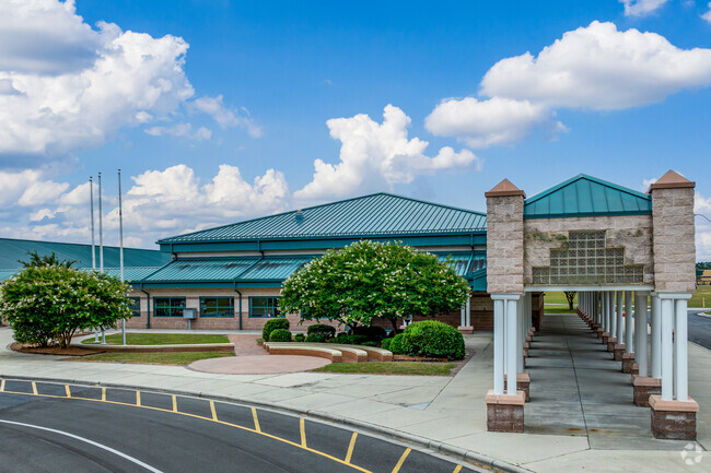 Jacksonville Commons Elementary School serves over 500 students in the Jacksonville area.
